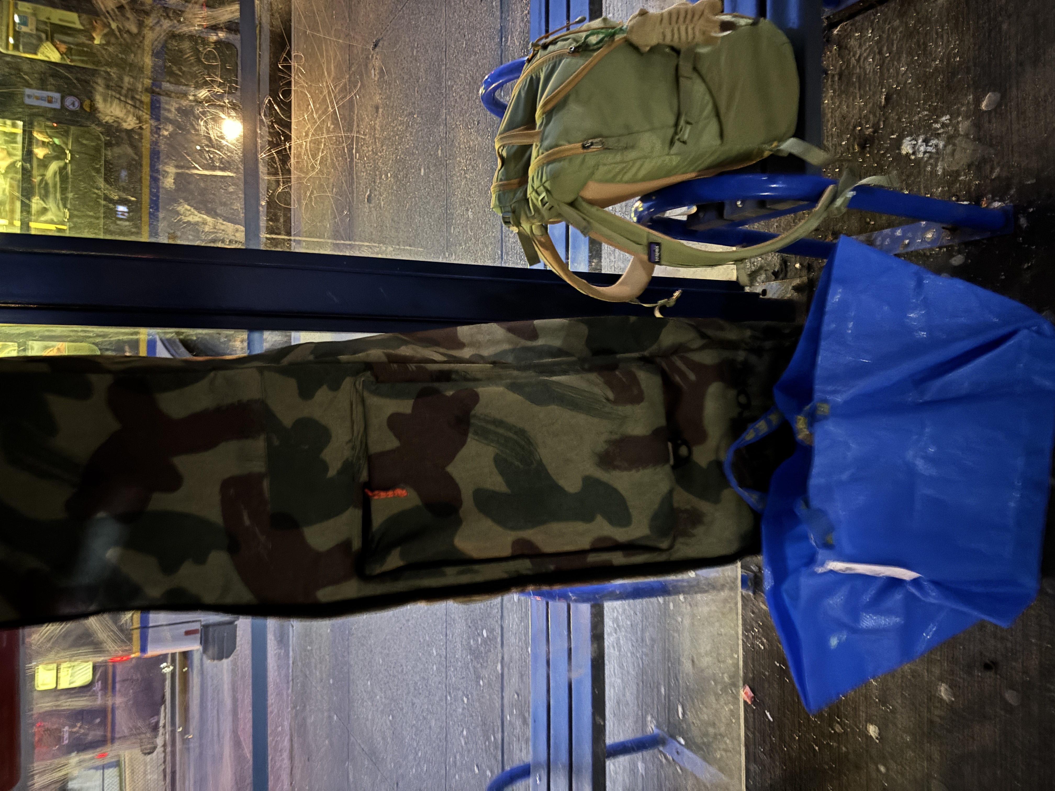 A snowboard bag, a backpack, and a big IKEA bag, filled with my whole snowboard gear